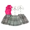 Conjunto de verano estilo coreano para niñas, diseñado para exportación: blusa sin mangas + falda plisada a cuadros, conjunto de dos piezas, en stock