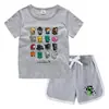 Estilo Novo Verão 2026 Camiseta de Gola Redonda e Shorts Infantis Estilo Coreano Absorvente de Suor Conjunto Casual de Camiseta para Crianças Pequenas e Médias