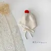 Touca de Bebê Fofa em Forma de Bolinha, Novo Estilo Outono e Inverno para Meninos e Meninas, Proteção para as Orelhas, Quente e à Prova de Vento, Lã Tricotada com Tiras
