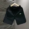 2026 Nova Tendência Shorts de Verão com Cordão Dopamina Masculino Versátil para Exterior Respirável Shorts Esportivos para Corrida Modernos