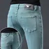 Temporada de primavera y otoño, pantalones de mezclilla grises para hombre, elásticos, modernos, corte ajustado, pierna cónica, estilo europeo, con estampados únicos, pantalones largos casuales