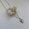 Collar con colgante de corazón geométrico vintage desgastado, cadena corta para clavícula de estilo minimalista hip-hop para mujer, joyería transfronteriza europea y americana