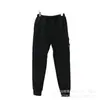 Pantalones Deportivos Casuales Funcionales de Punto para Hombre y Mujer con Bolsillo con Cremallera y Insignia de Brújula de Piedra Europea y Americana Transfronteriza