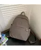 Mochila casual e leve, adequada para mulheres, estudantes e viagens; uma mochila versátil, casual e esportiva com um design simples, ideal para estudantes