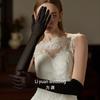 Guantes de malla lisa de alta elasticidad color blanco cremoso con lazo de encaje de tul al por mayor de fábrica para novia