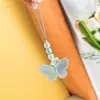 Cadena de teléfono móvil transfronteriza Lily mariposa colorida chica cadena corta para teléfono móvil funda de teléfono simple antigua cordón decorativo
