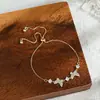 Corrente Elegante para Clavícula em Ouro Eletrodepositado com Zircônia Microincrustada para Mulheres, Pulseira Ajustável com Design de Borboleta Retrátil Atacado