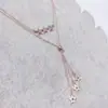 Explosivo Precio Especial Entrada Lujo Acero de Titanio alta calidad Perla Diamante Distintivo Doble Mate Borla Labios de Mariposa Mujer