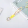 Cordón para teléfono móvil transfronterizo, llavero de cuerda tejida corta creativa, cordón colgante desmontable anti-pérdida, cordón para teléfono móvil anudado con bloques de color