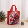 Bolsas de tela navideñas transfronterizas, bolsas de regalo, bolsas de tela temáticas de Santa Claus, bolsas de tela de Nochebuena, bolsas de tela coloridas de tela no tejida, en stock