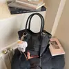 2026 Nuevo Bolso Cubo Simple de Comercio Exterior para Mujer, Bolso de Mano de Moda para Verano, Bolso Cruzado de Moda de Nicho para Viajes Diarios