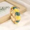 Bestseller transfronteiriço na Europa e América: Pulseira de design irregular em blocos de cores esmaltadas retrô criativas com design de bambu ondulado boêmio