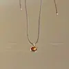 Collar de cadena extensible con colgante de ojo de tigre vintage para mujer, un accesorio refinado y lujoso con un estilo sofisticado y elegante, perfecto para combinar con suéteres.