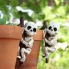 Set de Dos Colgantes para Maceta de Flor de Calavera de Halloween Transfronterizos Decoración de Taza para Maceta Colgante de Jardín Artesanía de Resina Ahora