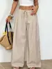 Exclusivo para vendas transfronteiriças: Calça casual listrada nova 2026 para mulheres com cintura de cordão, corte solto, calça longa de perna larga emagrecedora
