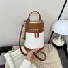Bolsa Versátil Color Block para o Dia a Dia Mulheres 2026 Novo Verão High-End Nicho Ombro Único Transversal Bolsa para Celular