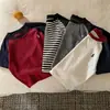 Camiseta infantil de manga corta 100% algodón 2026 nueva versátil moda simple elegante top para niños y niñas, bebés y niños pequeños, verano