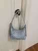 Bolso de axila de lunares con diseño de nicho coreano sensación de alta gama nuevo estilo 2026 moderno versátil para mujer de un solo hombro transfronterizo