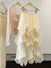 Saia Irregular de Renda para Bolo para Mulheres, Novo Estilo Verão 2026, Saia de Cintura Alta em Linha A de Comprimento Médio que Cobre os Quadris, com Barra Larga Evaseada e Design Bufante