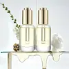 Botella gotero de vidrio de fondo grueso personalizada de 10 ml para aceite esencial, Botella de vidrio transparente para esencia, Botella dispensadora de solución original