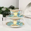 Taza de Café de Porcelana Fina Estilo Europeo con Fondo Verde y Diseño de Cabeza Humana, Adecuada para Uso en Casa, Té de la Tarde Británico, Cerámica Pintada en Oro, Juego de Caja de Regalo de Taza de Lujo Ligero