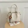 Bolso de mano grande de nueva temporada 2026 transfronterizo, bolso cubo casual para mujer, bolso de hombro y bolso cruzado de moda y versátil