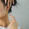 Pendientes de acero de titanio con diseño de corazón hueco de moda para mujer, chapados en oro de 18 quilates, temperamento transfronterizo europeo y americano