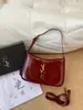 Suministro transfronterizo 2026 nuevo modelo bolso de mujer de cuero genuino de alta gama, bolso de axila con textura premium, bolso hobo