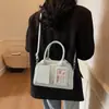 Moda Brillante de Primavera 2025 Cara Brillante Color Sólido Coreano Bolso Boston Portátil Diseño de Nicho Bolso de Hombro Cruzado