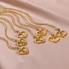 Moda Transfronteriza A-Z Collar con Letra Inglesa Hueca en Forma de Corazón para Mujer Creativo de Acero Inoxidable Flor de Amor Collar con Apellido Familiar