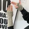 Guantes de punto para mujer en otoño e invierno, guantes sin dedos para hombre, calentadores de muñeca, guantes de lana de medio dedo, mangas postizas de pareja de estudiantes de color puro