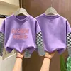 Linda camiseta básica de manga larga para niñas, colección primavera/otoño 2026, camiseta elegante de cuello redondo, algodón puro, aspecto en capas, para niños de talla mediana y grande
