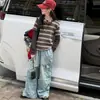 Camiseta listrada feminina com efeito de duas peças, novo conjunto infantil estilo coreano outono 2026, conjunto estiloso de duas peças para crianças maiores