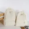 Nueva Mochila Sencilla Más Vendida Gran Capacidad Color Sólido Versátil Casual para Viaje Moda Mochila Escolar para Hombres y Mujeres