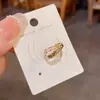 Moda Retro Francesa Estilo Simple Clips Metálicos para Orejas sin Perforación Incrustados con Diamantes con Diseño Único para Mujeres