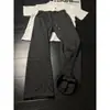 Directo de fábrica, pantalones transpirables estilo retro americano con patrón de espinas, pantalones fluidos para hombre, pantalones deportivos casuales de pierna recta para primavera y otoño