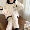 Fábrica fuente pijama nuevo de manga larga de forro polar coral para mujer otoño e invierno franela gruesa invierno conjunto para estar en casa