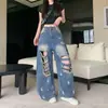 Comercio transfronterizo primavera mujer estampado de letras chica popular pantalones largos de pierna ancha jeans rotos con diseño único de salpicaduras de tinta y lavado vintage