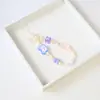 Nuevo Cordón para Teléfono Móvil de Girasol Estilo Corto Femenino Creativo Cadena de Perlas de Color Puro Cadena para Colgar el Teléfono Móvil Accesorios Decoración Pequeña para Bolsa Fresca