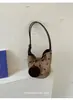Bolso de mano único de lunares para mujer, bolso tote pequeño exquisito y súper popular, nuevo bolso de hombro versátil de moda 2026, bolso tipo cubo personalizado