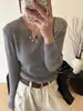 Suéter de punto de manga larga con cuello en V para mujer, nuevo top de punto ajustado otoño 2026, camiseta básica para mujer
