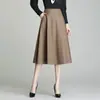 Saia longa de cor sólida com caimento estilo coreano e barra ampla, nova saia de cintura alta outono 2026, saia midi evasê feminina elegante e moderna