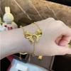 TikTok Red Net Explosiones Vietnam Sha Jin Moda a granel Lazo de Princesa Borla Amor Cadena para Clavícula Chapada en Oro de 24 Quilates