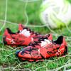 Chuteiras de futebol infantil com pontas longas TF, sapatos de treinamento de grama artificial, sapatos de competição de xadrez vívido para estudantes adultos