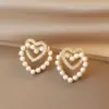 Aretes de Aguja de Plata S925 Coreanos Nuevos Explosiones Aretes para Niñas Temperamento Simple Joker Aretes Tono Agitado con Aretes Venta al por Mayor