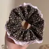 Estilo perezoso 2026 nuevo coletero de oso con pompón y diseño floral, accesorio para el cabello retro y de alta gama para mujeres
