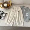 Calça comprida infantil 2026 primavera e outono estilo floresta infantil versátil cor sólida casual calça estilosa novo estilo japonês para bebês