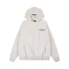 Sudadera con capucha de la línea Essentials de FEAR OF GOD, de moda, con logo en relieve en el pecho y conjunto de pantalones FOG