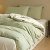 Juego de cuatro piezas de algodón puro cepillado de lujo ligero para otoño e invierno, juego de ropa de cama de tres piezas de color liso bicolor de algodón cálido y grueso