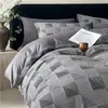 Juego de ropa de cama a rayas de cuatro piezas 100% algodón, Clase A, estilo simple, funda de edredón, sábana plana, sábana ajustable, algodón puro de 60 hilos, algodón lavado